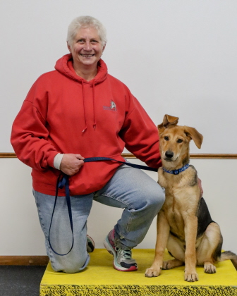 Dog and owner posing for obedience class picture
